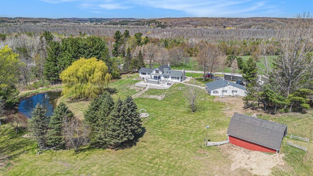 3121 Grace Rd, Frankfort, MI 49635 - view of property location with a forest and a nearby body of water