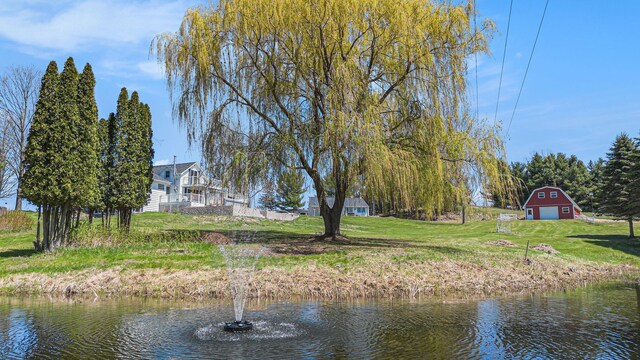 3121 Grace Rd, Frankfort, MI 49635 - water view featuring a barn