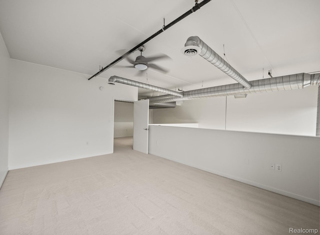 610 S Troy St, Royal Oak, MI 48067 - garage featuring a ceiling fan and baseboards