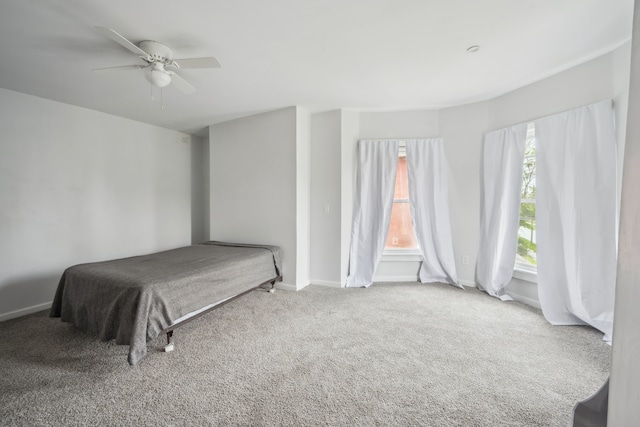 700 W Euclid St, Detroit, MI 48202 - carpeted bedroom with baseboards and a ceiling fan