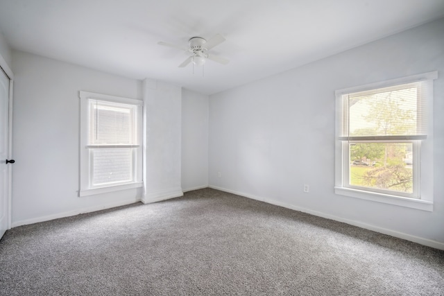 700 W Euclid St, Detroit, MI 48202 - carpeted empty room with baseboards and ceiling fan