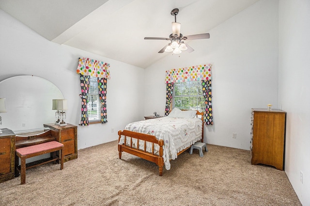 carpeted bedroom with a ceiling fan and lofted ceiling