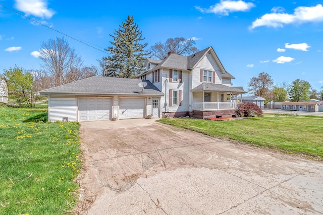 view of front of house with covered porch, driveway, a front yard, an attached garage, and a shingled roof