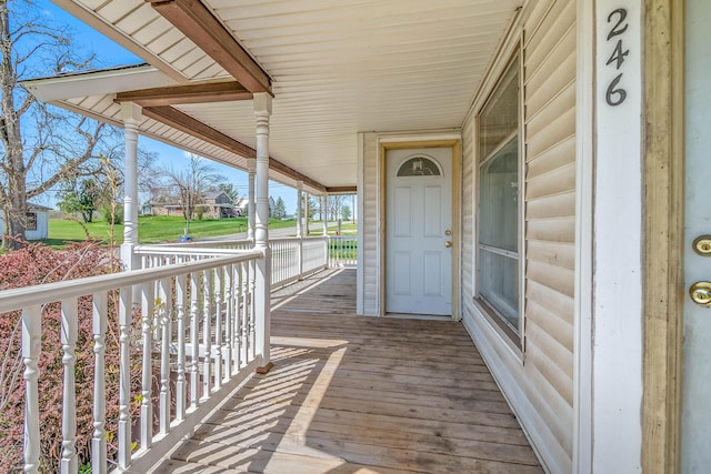 wooden terrace with covered porch