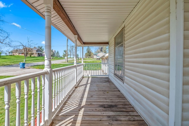 wooden deck featuring covered porch