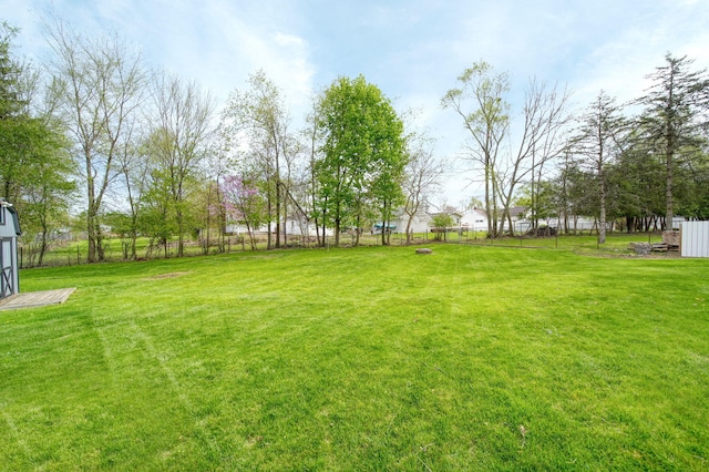 view of yard with fence