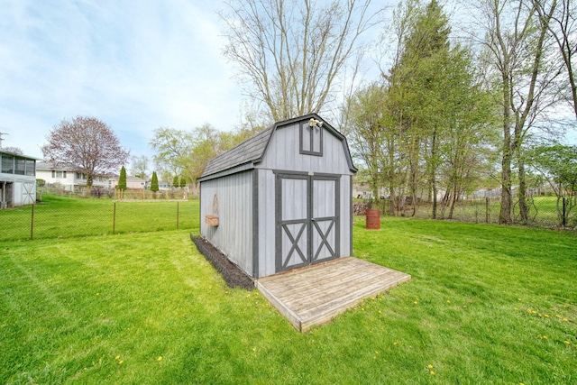 view of shed with fence