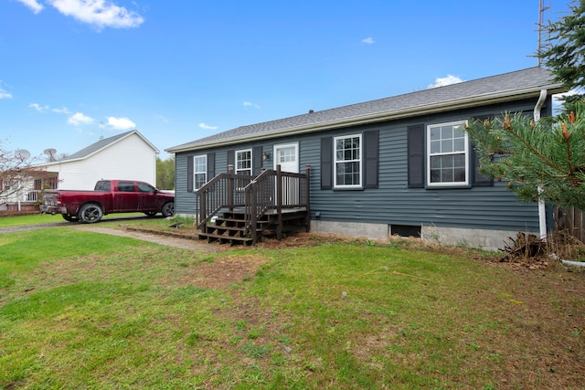 view of front facade with a front yard