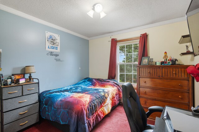 bedroom featuring carpet flooring, a textured ceiling, and ornamental molding