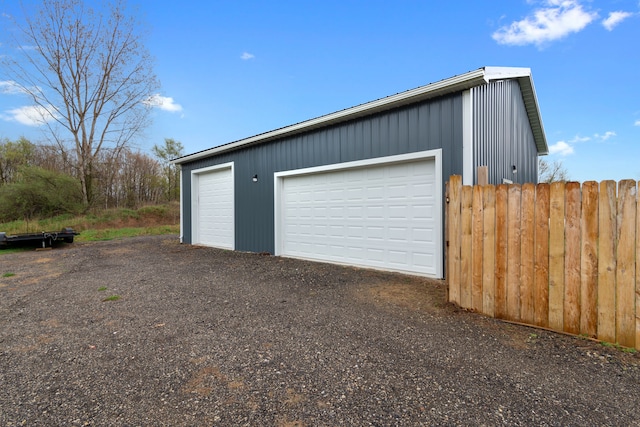 detached garage with fence