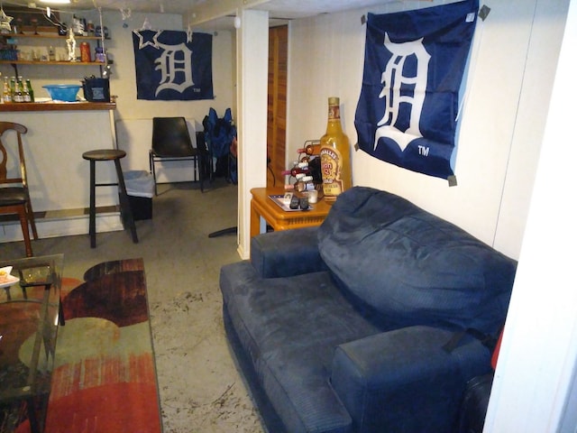 living room featuring concrete flooring