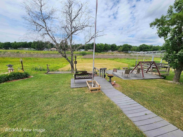 view of home's community featuring a yard