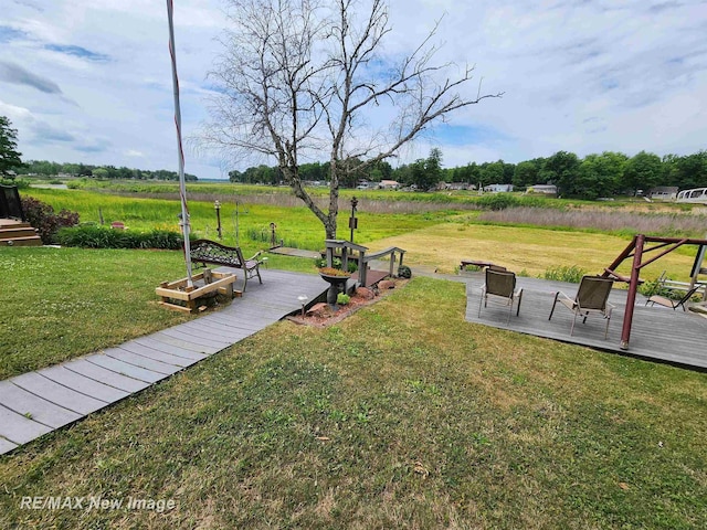 view of yard featuring a deck