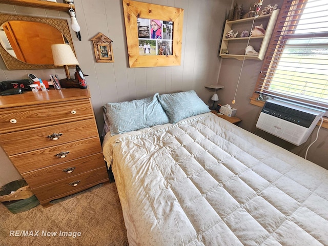 bedroom with carpet flooring and cooling unit
