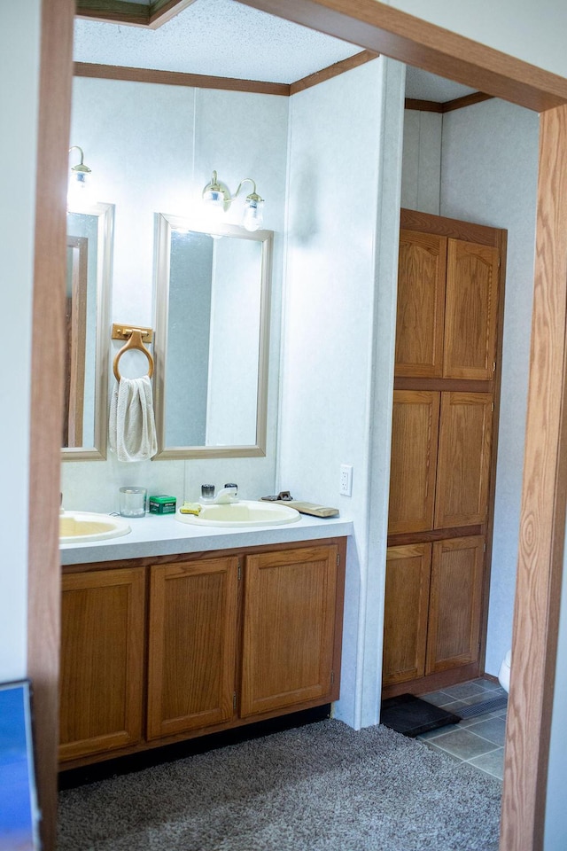 full bath featuring double vanity and a sink