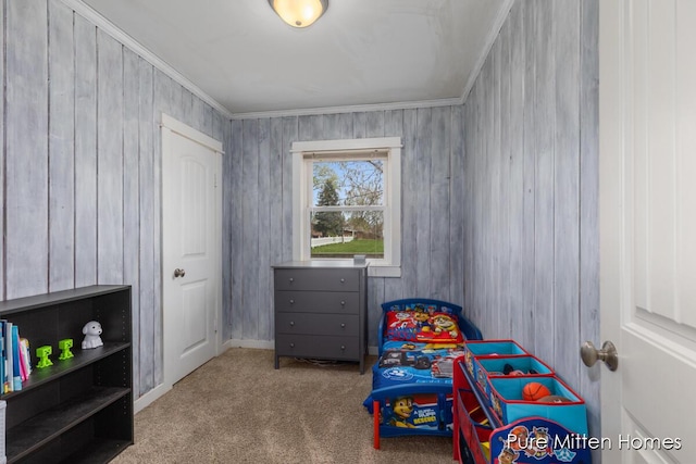 bedroom with carpet floors and crown molding