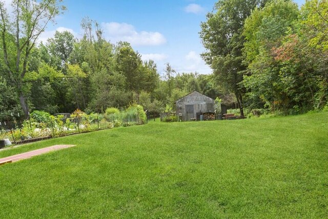 6460 E Galien Buchanan Rd, Buchanan, MI 49107 - view of yard with a barn, fence, and an outdoor structure