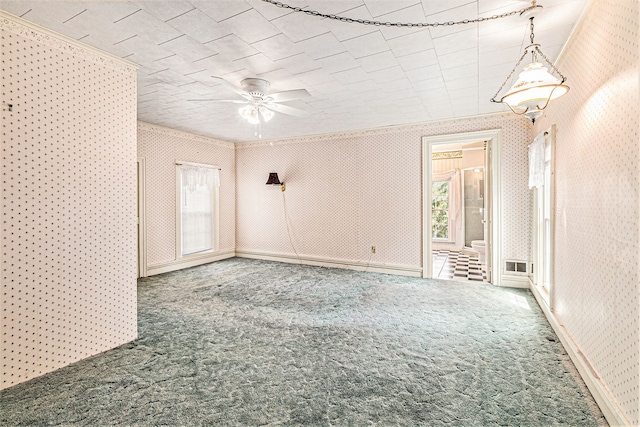 310 E Unadilla St, Pinckney, MI 48169 - unfurnished room featuring carpet floors, ceiling fan, and ornamental molding