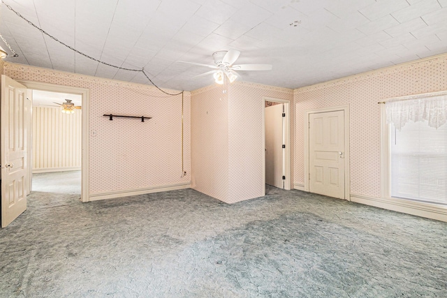 310 E Unadilla St, Pinckney, MI 48169 - carpeted spare room featuring a ceiling fan and wallpapered walls
