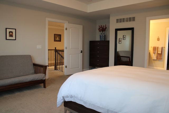 bedroom featuring carpet floors and visible vents
