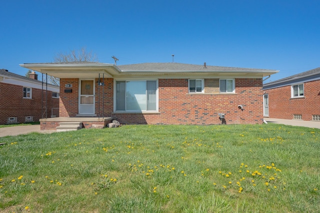 31825 Eveningside, Fraser, MI 48026 - view of front of property featuring brick siding and a front yard