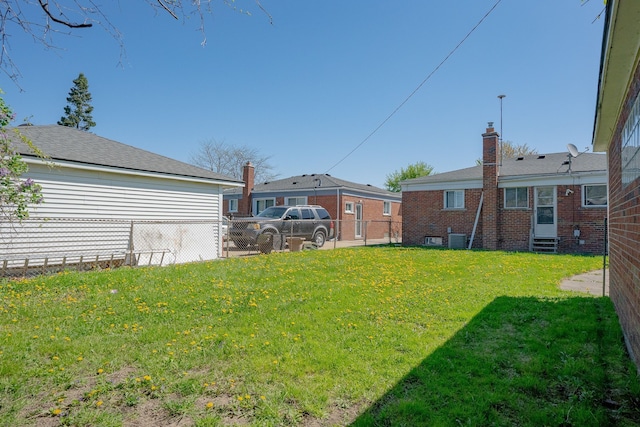 31825 Eveningside, Fraser, MI 48026 - view of yard featuring entry steps and central AC