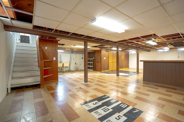 31825 Eveningside, Fraser, MI 48026 - finished basement featuring tile patterned floors, stairs, bar, wooden walls, and a paneled ceiling