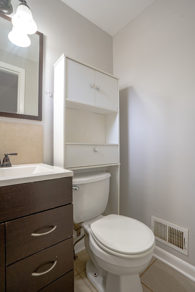 31825 Eveningside, Fraser, MI 48026 - bathroom featuring toilet, vanity, and tile patterned floors