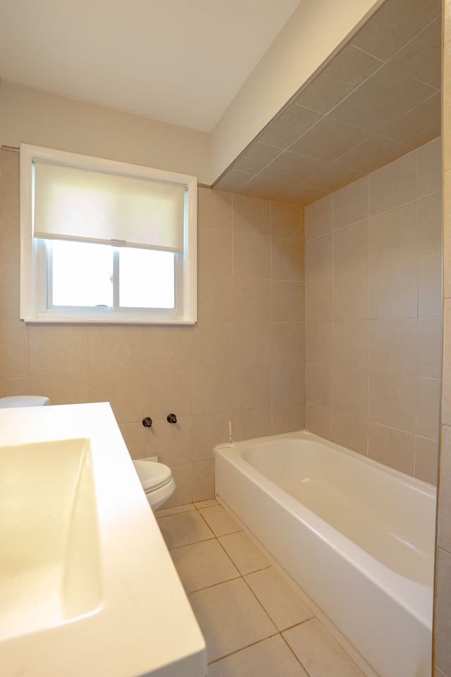 31825 Eveningside, Fraser, MI 48026 - bathroom featuring tile patterned floors, toilet, tile walls, a garden tub, and a sink