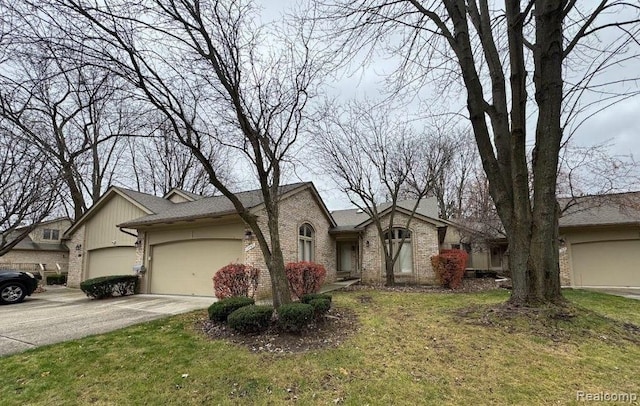 ranch-style home featuring brick siding, a garage, driveway, and a front yard