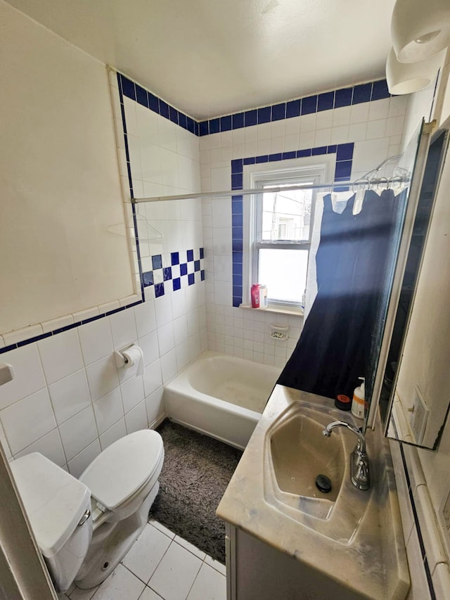 4010 Stolzenfeld Ave, Warren, MI 48091 - full bath featuring vanity, tile patterned floors, toilet, and tile walls
