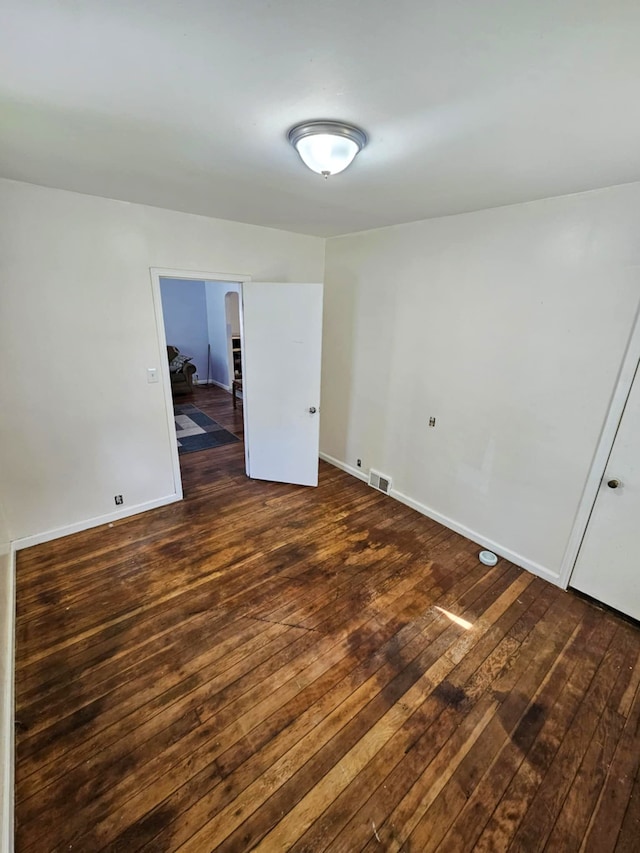 4010 Stolzenfeld Ave, Warren, MI 48091 - unfurnished room with visible vents, wood-type flooring, and baseboards