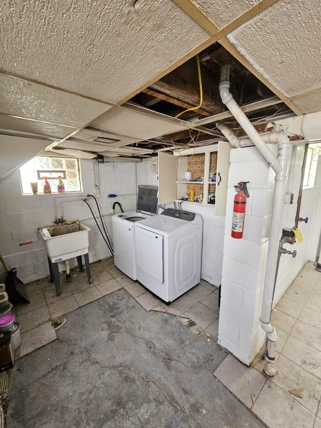 4010 Stolzenfeld Ave, Warren, MI 48091 - basement featuring independent washer and dryer and a sink