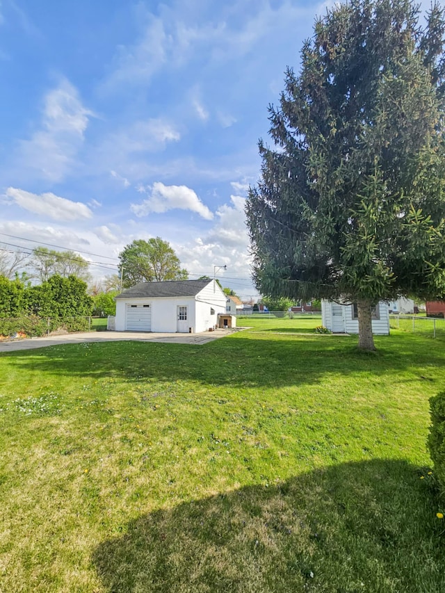 4010 Stolzenfeld Ave, Warren, MI 48091 - view of yard with a garage and an outdoor structure