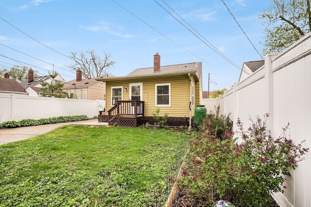1343 Northway St, Ferndale, MI 48220 - rear view of property with a fenced backyard, a chimney, and a yard
