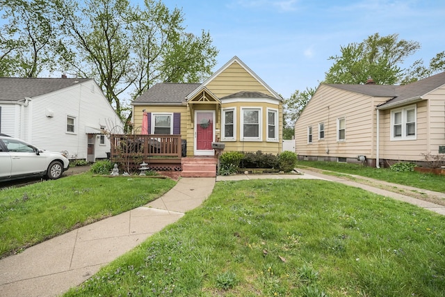 1343 Northway St, Ferndale, MI 48220 - bungalow-style home featuring a deck and a front lawn