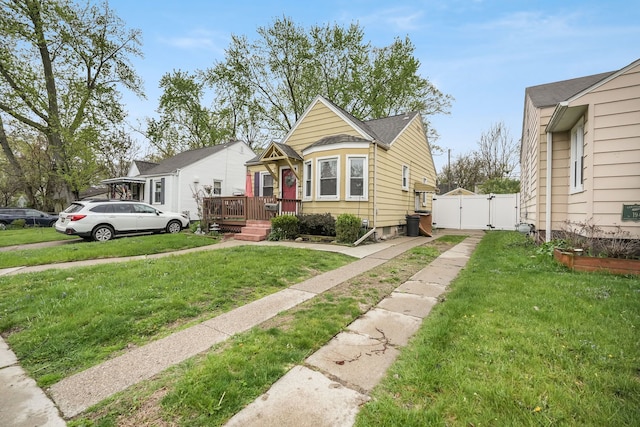 1343 Northway St, Ferndale, MI 48220 - bungalow-style home featuring fence, a gate, driveway, and a front yard