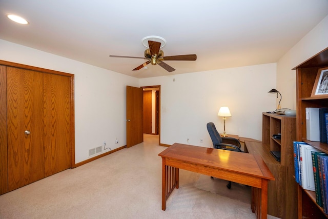 carpeted home office with a ceiling fan, visible vents, and recessed lighting