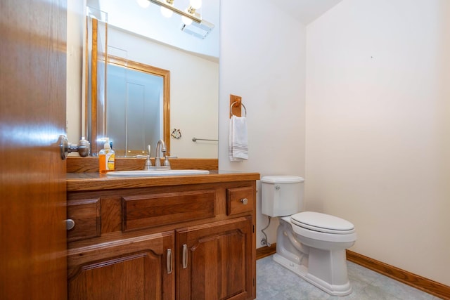 half bath featuring toilet, baseboards, visible vents, and vanity