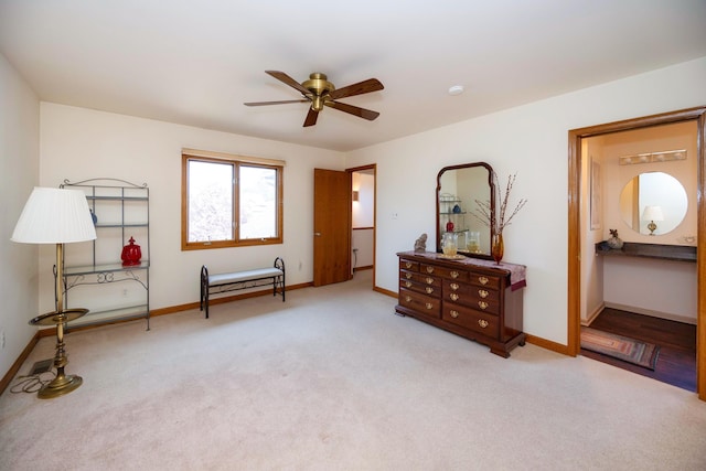 bedroom featuring baseboards and carpet