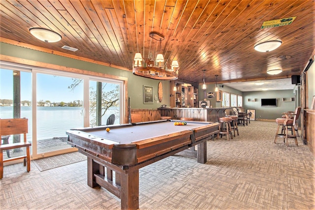 game room featuring visible vents, light carpet, wood ceiling, a water view, and pool table
