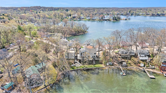 birds eye view of property featuring a residential view and a water view