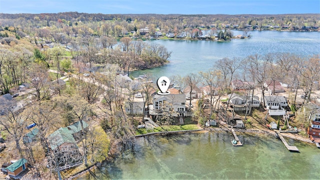 aerial view with a water view and a residential view