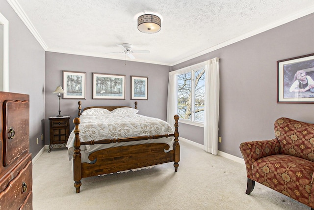 bedroom with light carpet, a textured ceiling, a ceiling fan, baseboards, and ornamental molding