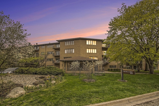 view of property at dusk