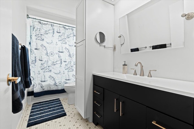 full bath featuring toilet, shower / bath combo with shower curtain, tile patterned flooring, and vanity