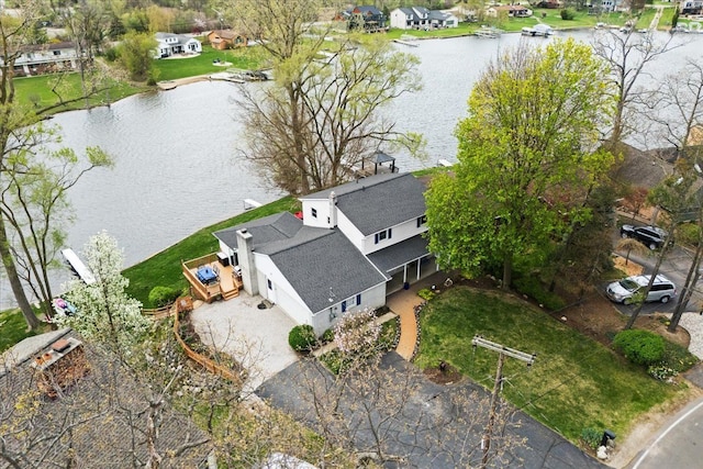 aerial view featuring a water view and a residential view
