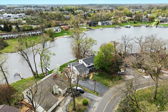 aerial view featuring a residential view and a water view