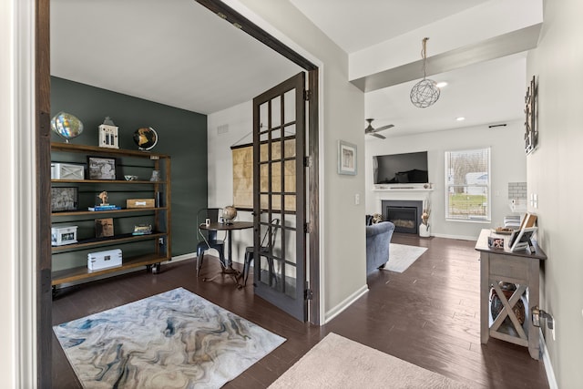 hall with baseboards, recessed lighting, and wood finished floors