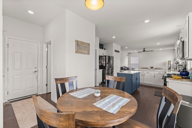 dining room with recessed lighting, a ceiling fan, and dark wood finished floors